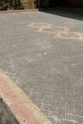 Fully restored block paving driveway in Dudley after jet washing and fresh kiln-dried sand replacement.