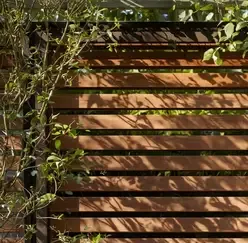 Horizontal slatted timber garden screen installed in Stourton DY7