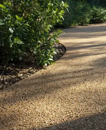 Porous UV-stable resin-bound driveway surfacing installed in Sedgley