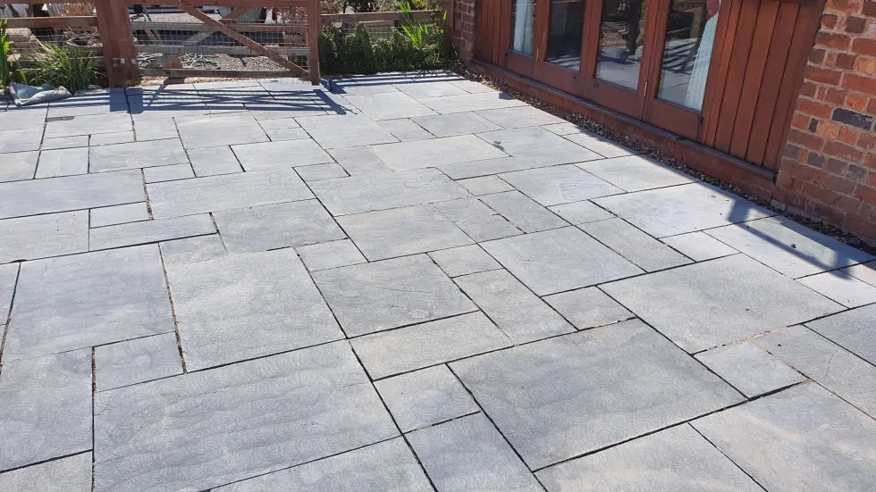 Large area of mixed pattern patio installed in Bilston