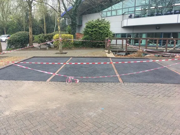 Black tarmac driveway installation with block border in Stourbridge
